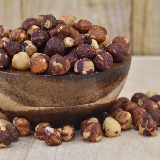 hazelnut in wood bowl