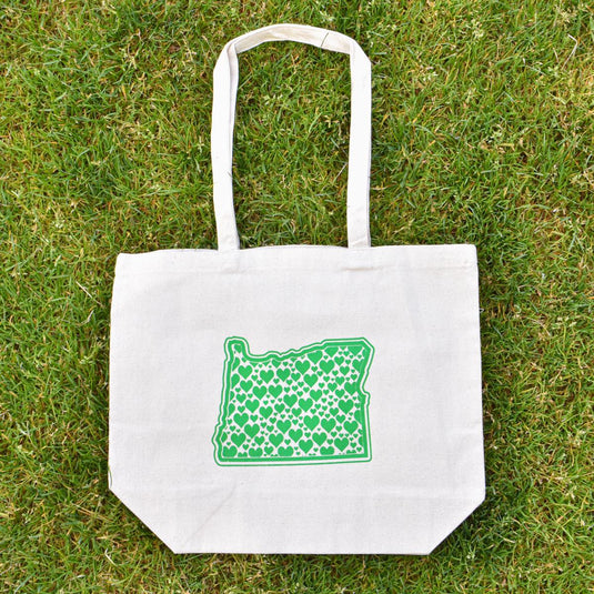 Cascade Provisions Oregon Hearts Tote on grass