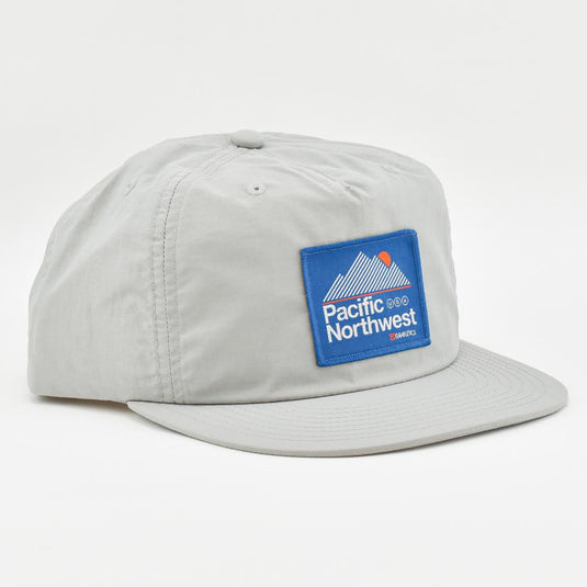 Grafletics PNW Peak Hat on table
