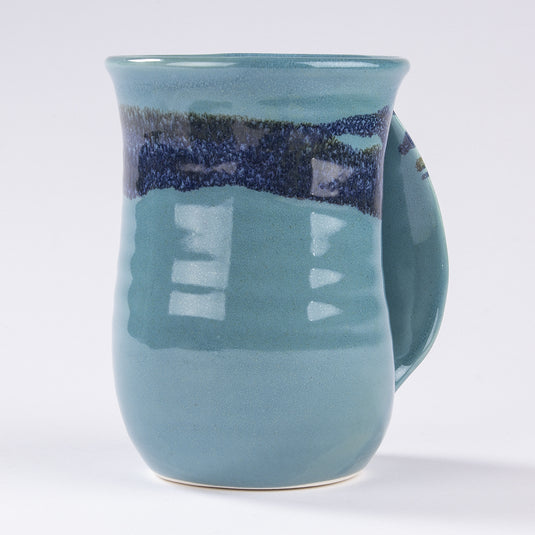 Clay In Motion Raging Rapid Handwarmer Mug Right Hand