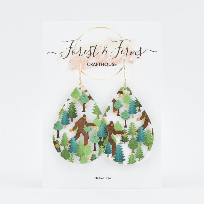 Load image into Gallery viewer, Bigfoot in the Forest Teardrop Acrylic Earring on card
