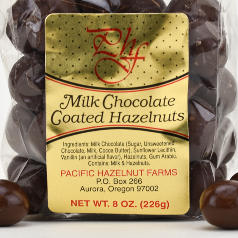Load image into Gallery viewer, Pacific Hazelnut Farms Milk Chocolate Hazelnuts, 8oz.
