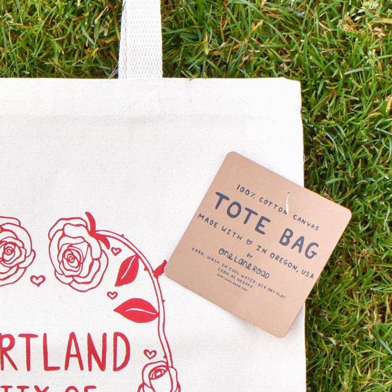 Load image into Gallery viewer, One Lane Road Portland City of Roses Canvas Tote Bag label
