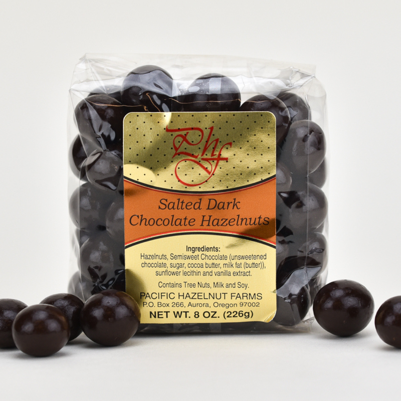 Load image into Gallery viewer, Pacific Hazelnut Farms Salted Dark Chocolate Hazelnuts 8oz Bag
