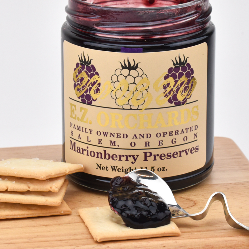 Load image into Gallery viewer, E.Z. Orchards Marionberry Preserves lifestyle photo with crackers and jam
