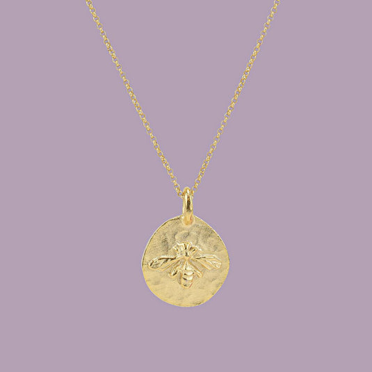 Gold Bee Disk Necklace front