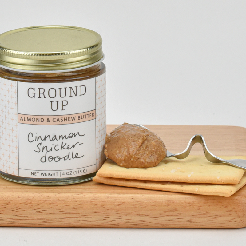 Load image into Gallery viewer, Ground Up Cinnamon Snickerdoodle Nut Butter Lifestyle photo with crackers
