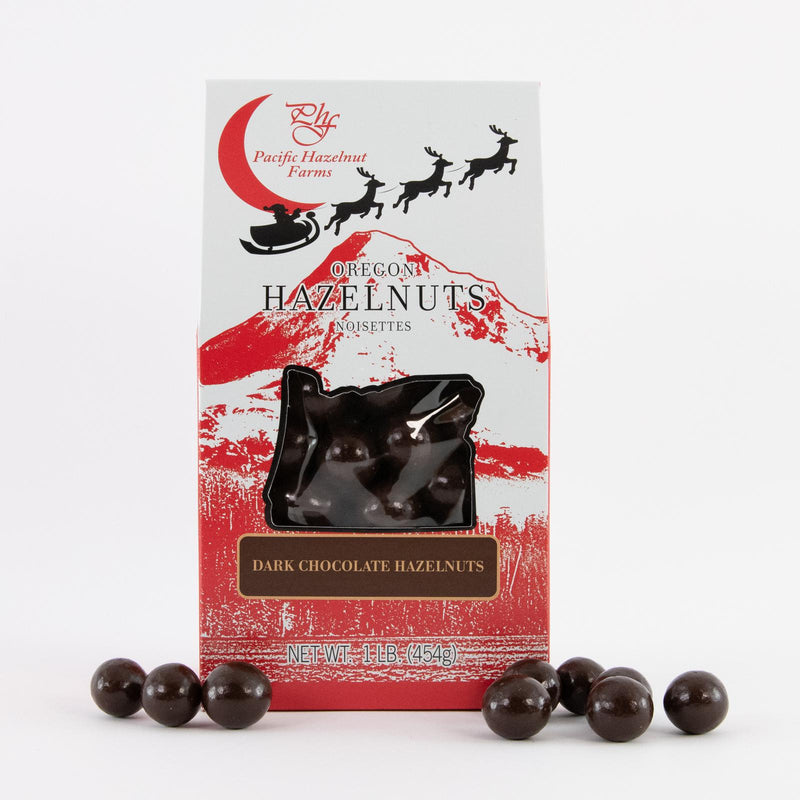 Load image into Gallery viewer, Pacific Hazelnut Farms Dark Chocolate Hazelnuts in Holiday Box, 16oz.
