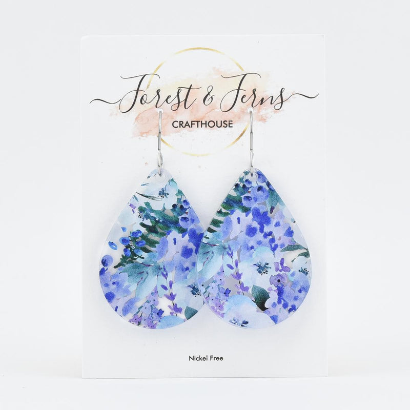 Load image into Gallery viewer, Blue and Purple Flower Teardrop Acrylic Earrings on card
