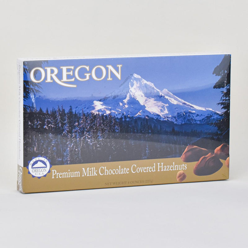 Load image into Gallery viewer, The Candy Basket Milk Chocolate Covered Hazelnuts in Mt. Hood Oregon Box

