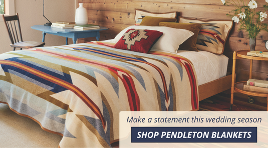 Pendleton wool blanket on bed - shop pendleton blankets for wedding season