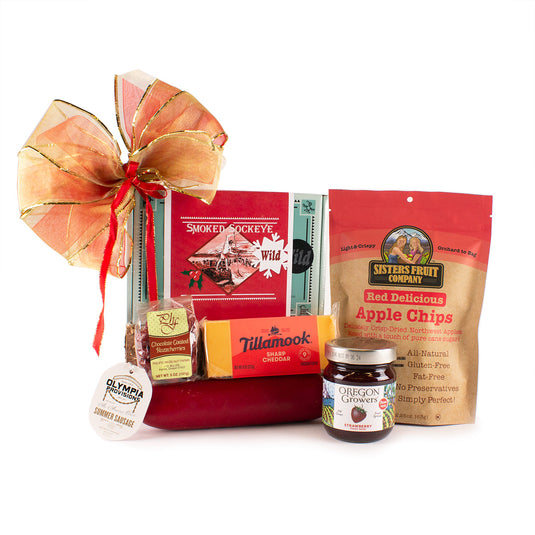 Made in Oregon Big Red Gourmet Gift Basket featuring smoked sockeye salmon, locally made strawberry jam, summer sausage, Tillamook cheese, Sister Fruit Company Apple Chips, and chocolate covered razzcherries.