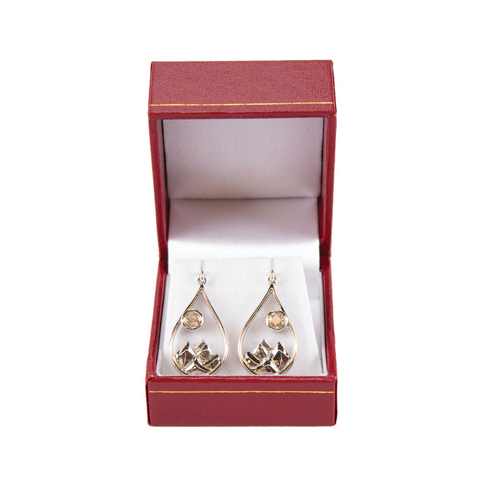 Teardrop Sunstone Earrings featuring a mountain design and 5mm sunstone gem as the sun.