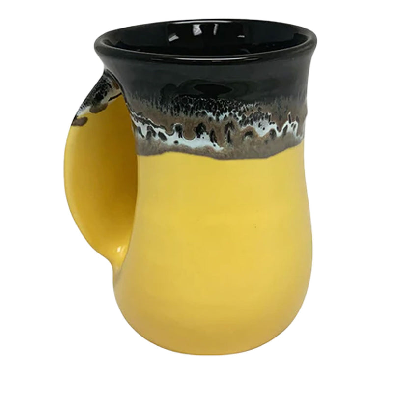 Load image into Gallery viewer, Clay In Motion Black Yellow Handwarmer Mug, Left Hand
